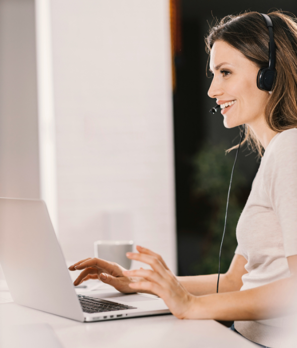 A smiling receptionist ready to get you found